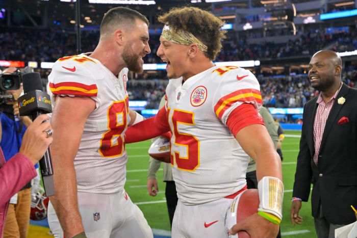 Kansas City Chiefs tight end Travis Kelce, left, and quarterback Patrick Mahomes celebrate after the Chiefs defeated the Los Angeles Chargers 30-27 in an NFL football game Sunday, Nov. 20, 2022, in Inglewood, Calif.